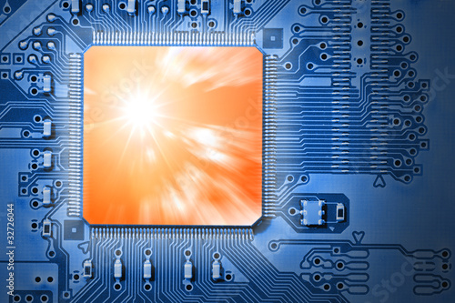 Powerful, Fast Orange CPU / Processor on Blue Circuit Board