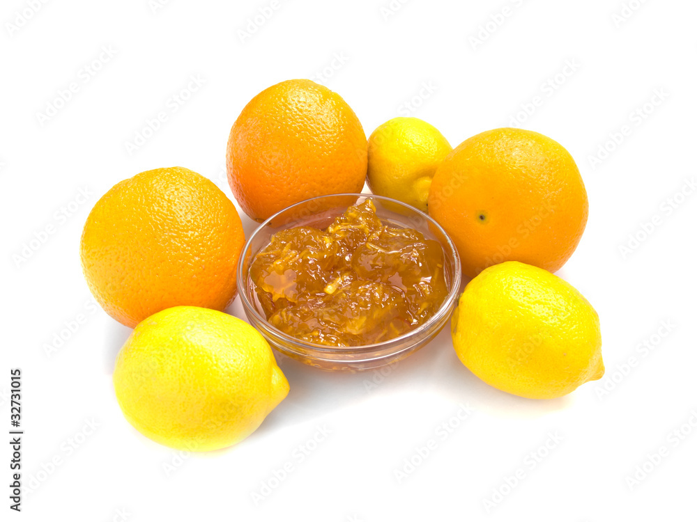 citrus jam with orange and lemon isolated over white citrus jam with orange and lemon isolated over white