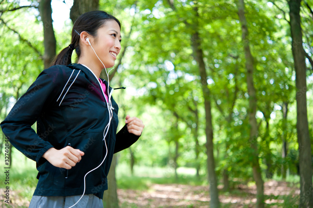 beautiful asian woman jogging in the park beautiful asian woman jogging in the park