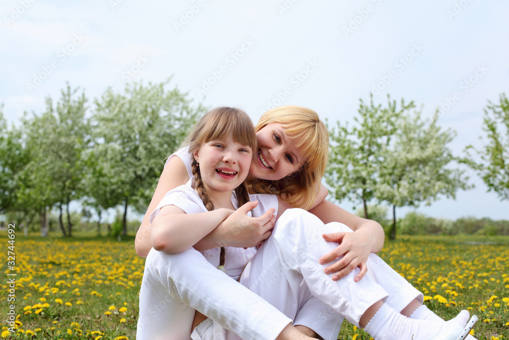 girl with mother in spring park