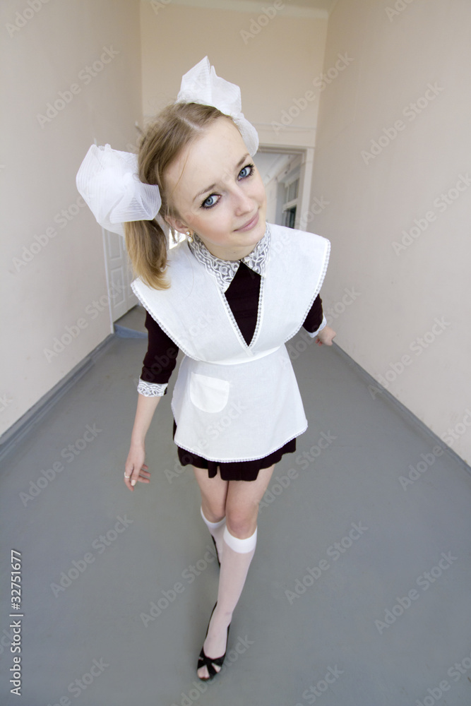 Foto Stock Russian schoolgirl in uniform Adobe Stock