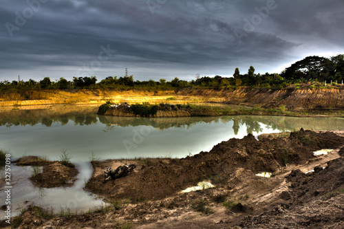 Fototapeta Naklejka Na Ścianę i Meble -  Land and a large pond on the farm in Thailand.