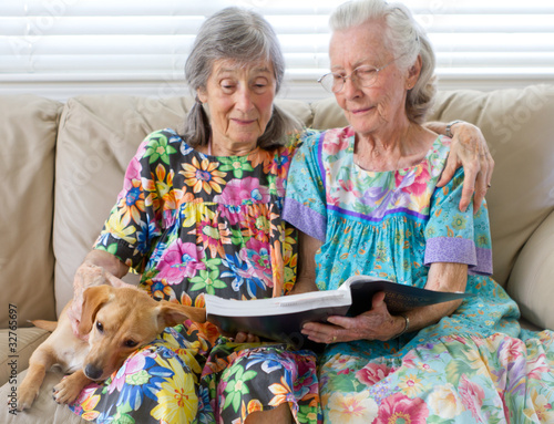 Seniors Sharing A Good Book