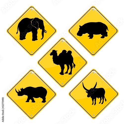 Yellow traffic signs with African animals
