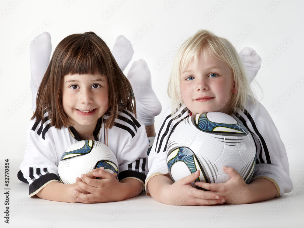 Two little girls as football fans like the Woman´s World Cup Two little girls as football fans like the Woman´s World Cup