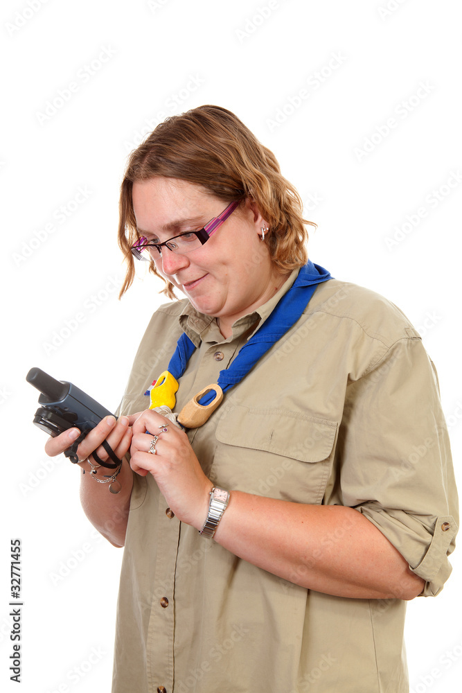 Dutch female scout with gps navigation over white background Dutch female scout with gps navigation over white background