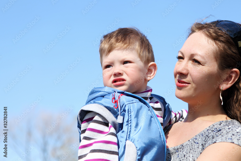 litlle boy with mother in the park litlle boy with mother in the park