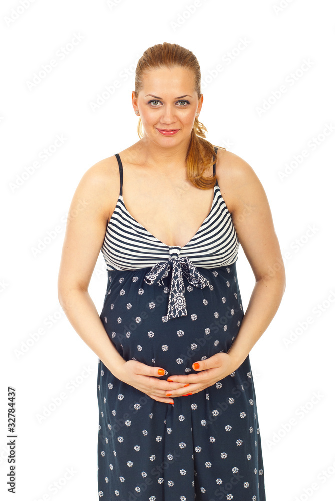 Happy pregnant woman holding her belly Happy pregnant woman holding her belly