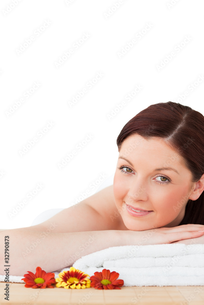 Portrait of a young red-haired woman posing while relaxing in a Portrait of a young red-haired woman posing while relaxing in a
