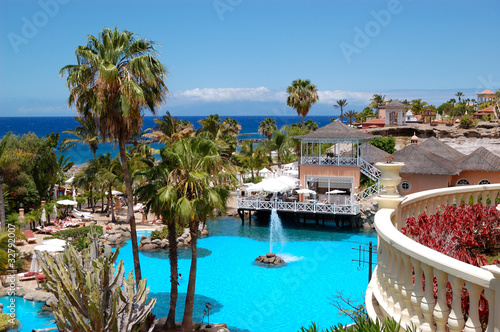 Swimming pool, open-air restaurant and beach of luxury hotel, Te