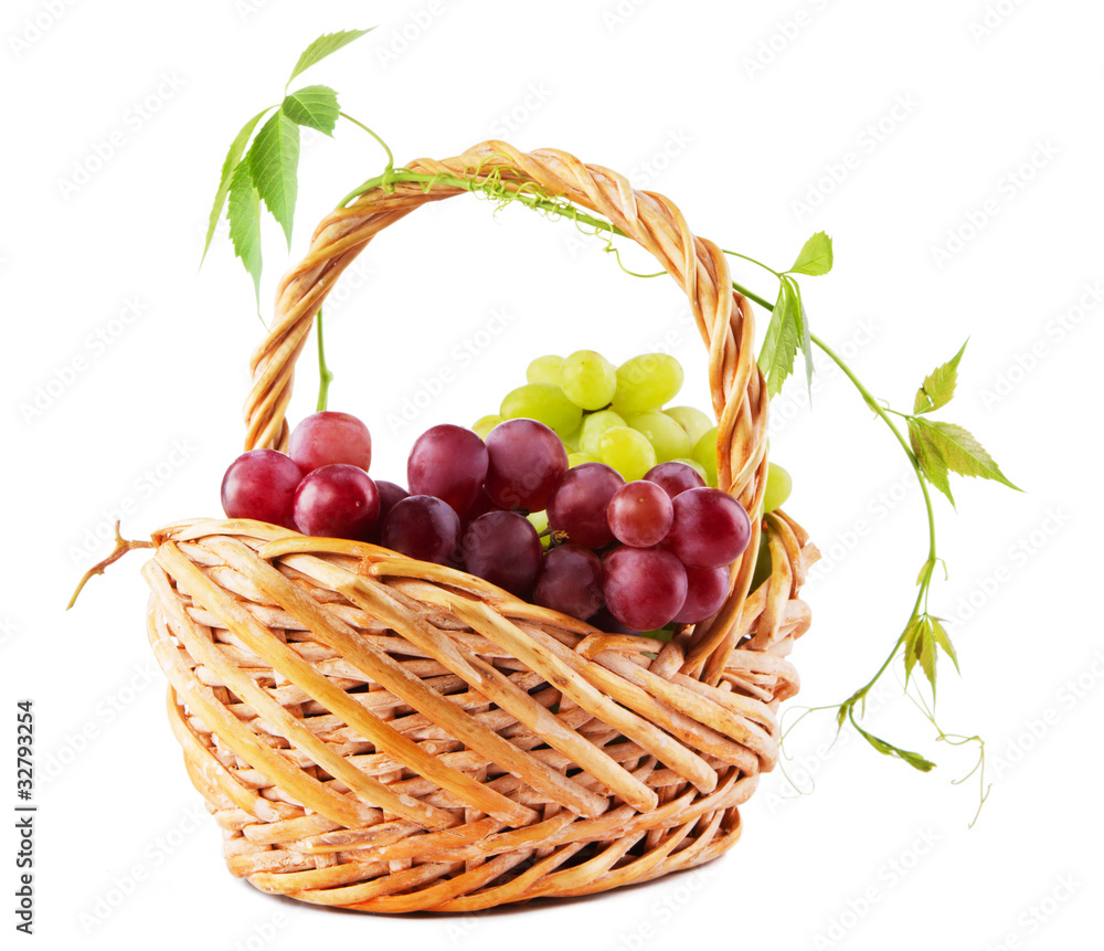 Wicker basket with grapes Wicker basket with grapes