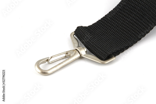 Snap clasp on a strap  on a white background.