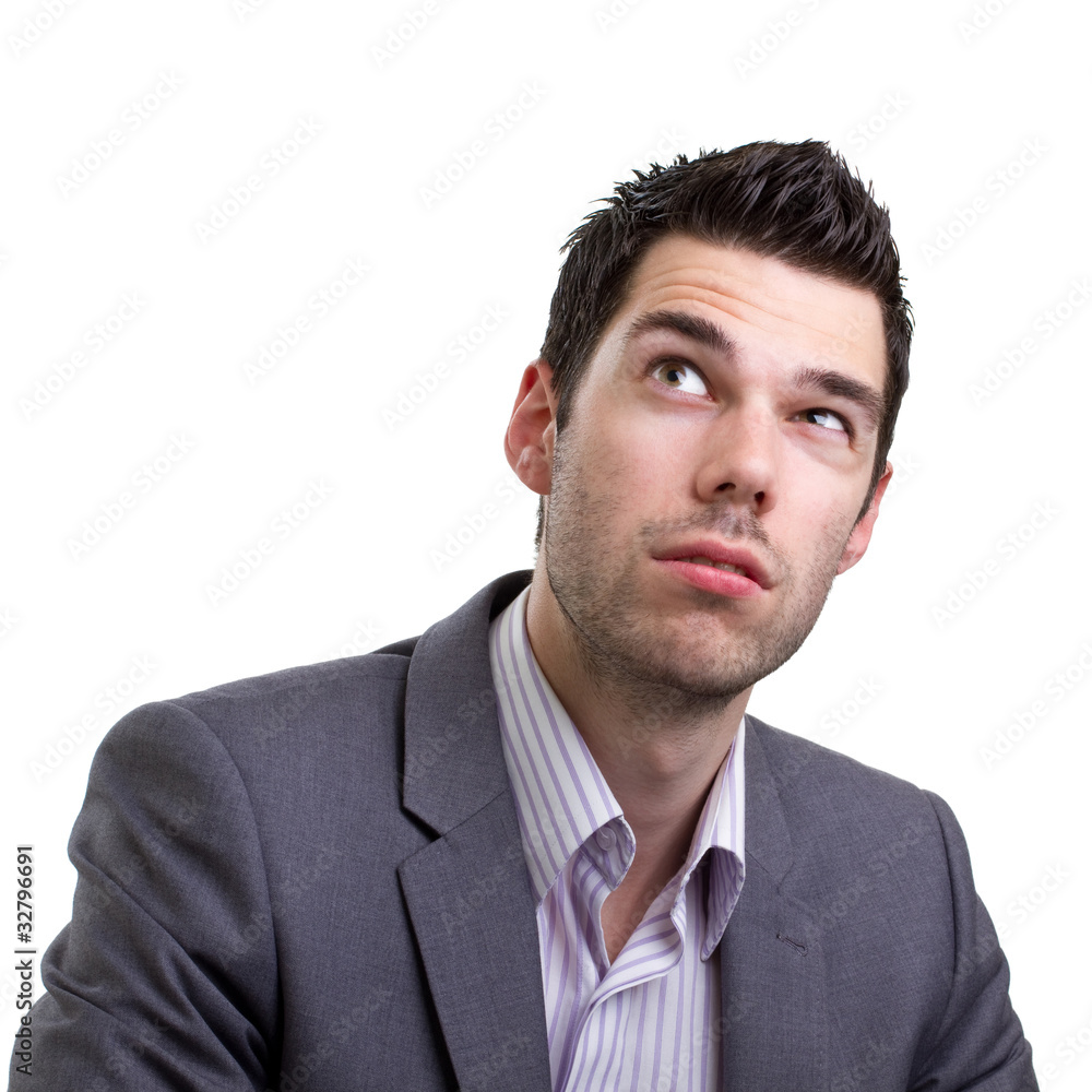 Attractive young business man thinking Attractive young business man thinking