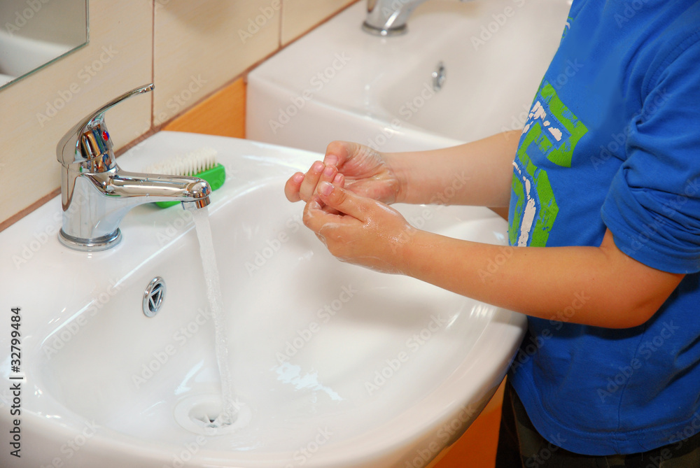 little boy cleaning hands in bathroom little boy cleaning hands in bathroom