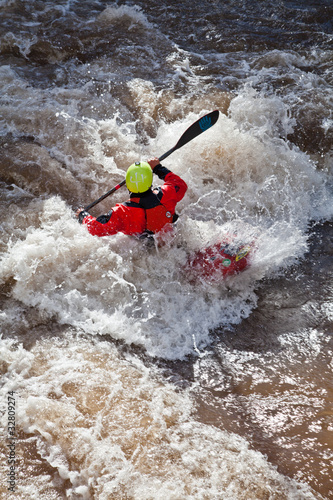 Freestyle kayak in whitewater