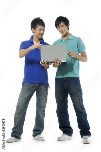 Two young attractive young man with laptop © William WANG
