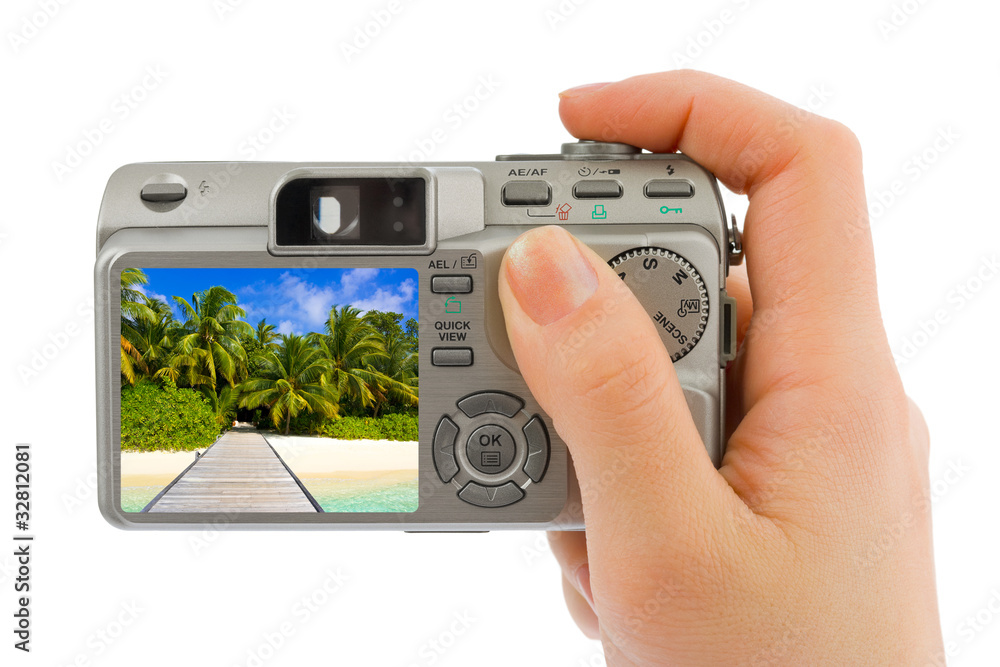 Hand with camera and landscape (my photo) Hand with camera and landscape (my photo)