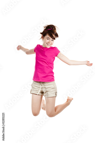 Girl jumping isolated on white background