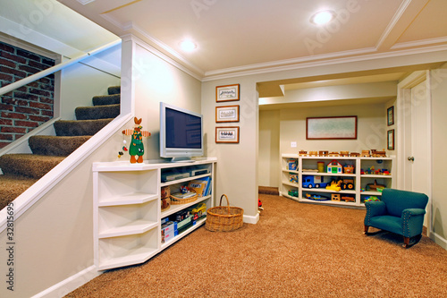 Play room in a  white basement living room photo