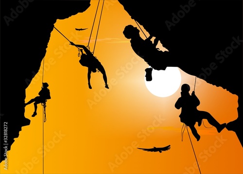 Climbing the rock at sunset