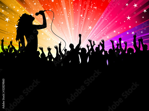 Female Singer performing in front of a crowd