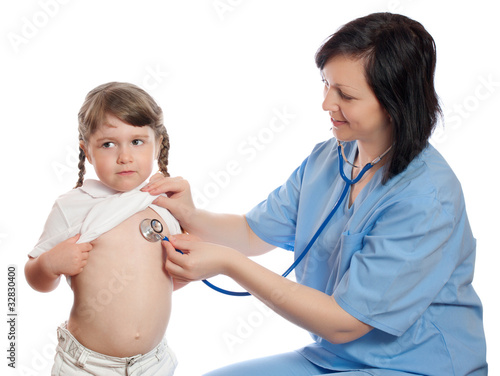 doctor listens by stethoscope girl