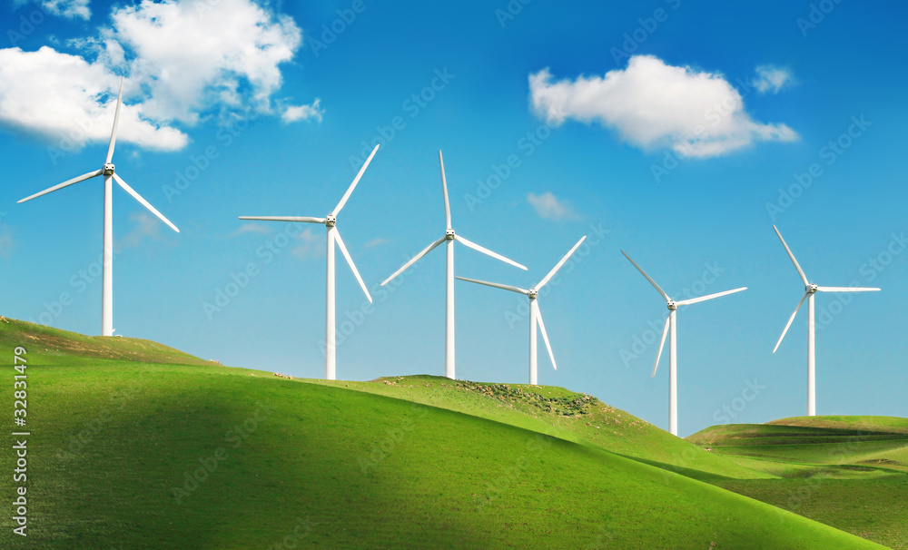 Wind turbines on green hills