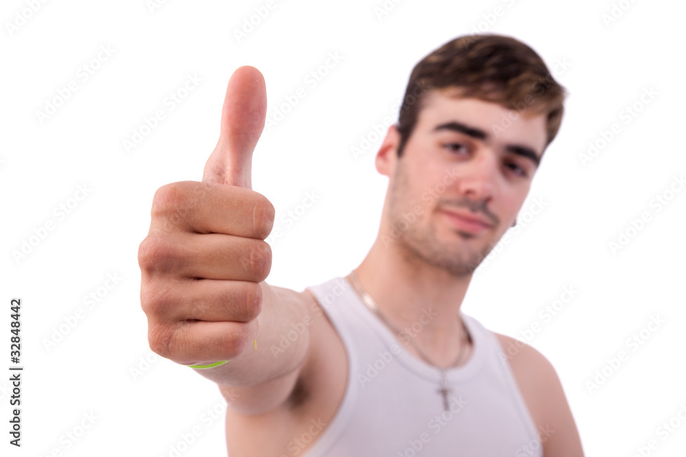 young man smiling, with thumb up young man smiling, with thumb up