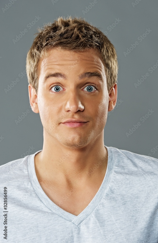 Fototapeta premium Young handsmoe funny man