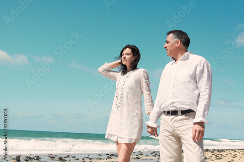 couple standing at the beach