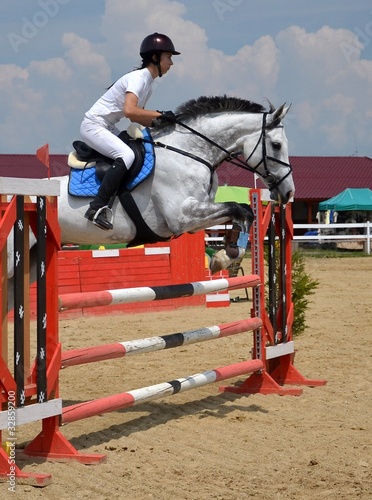 horse rider jumping