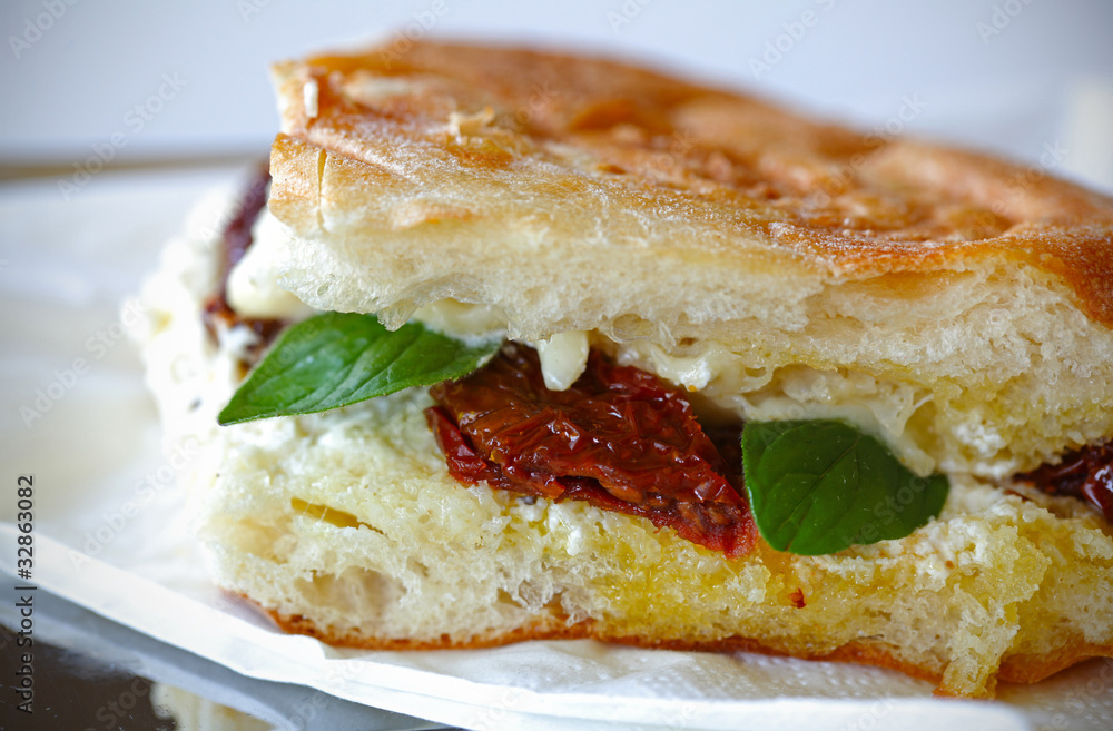 Grilled sandwich with fresh cheese and sun dried tomatoes Grilled sandwich with fresh cheese and sun dried tomatoes