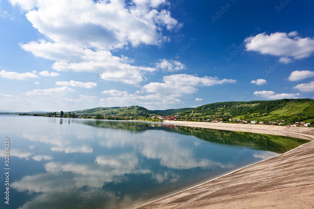Fototapeta premium Dam lake under blue sky
