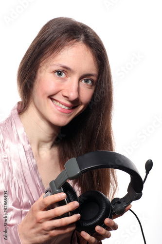 Beautiful smiling young woman with headphones