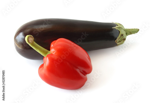 Eggplant and pepper on a white background