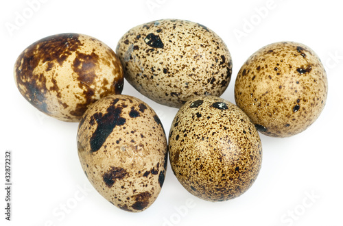 Quail eggs isolated on white the background