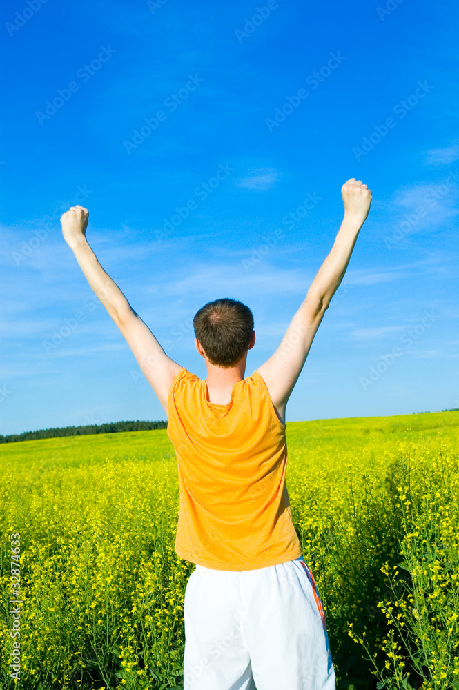 man with his hands up on the field man with his hands up on the field
