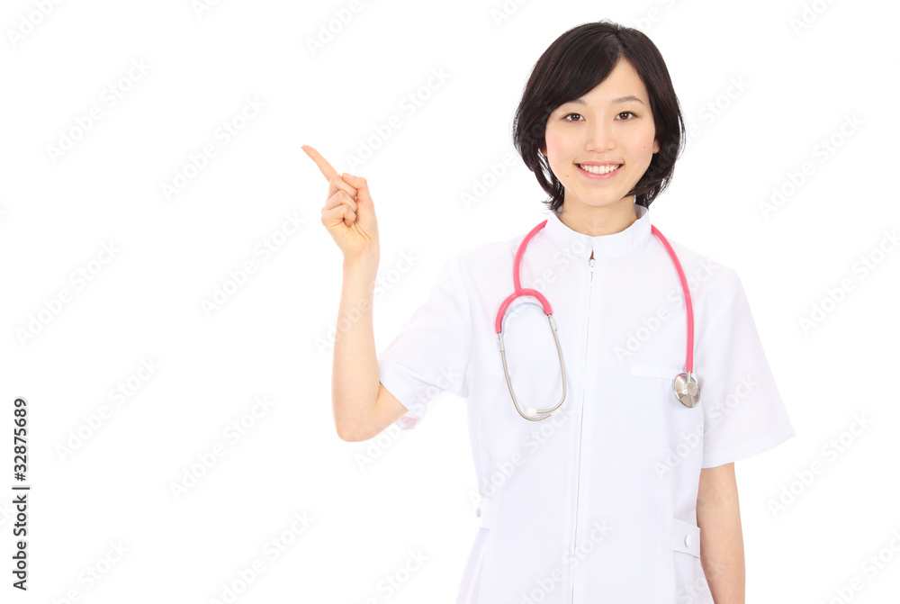 指さす白衣を着た女性 指さす白衣を着た女性