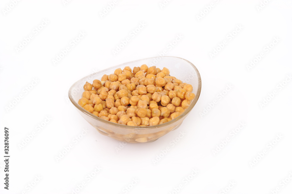 Close up view of chickpea in bowl on white background Close up view of chickpea in bowl on white background