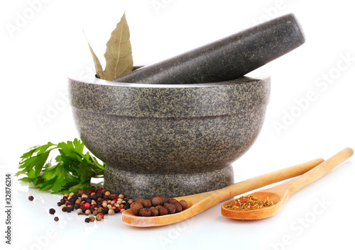 Tela Mortar and pestle, parsley, bay leaf and pepper isolated on whit