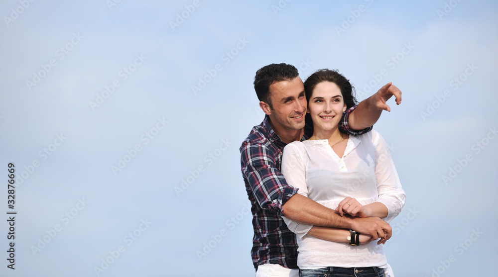 happy young couple have fun on beach happy young couple have fun on beach