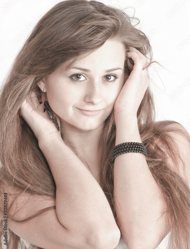 Obraz premium Sensual young woman with beautiful long brown hairs