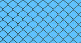 iron wire fence isolated on blue background
