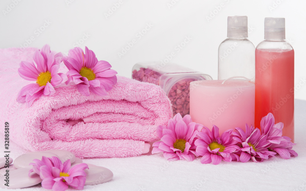 Spa still like with bath foam, candle, stones and flowers Spa still like with bath foam, candle, stones and flowers