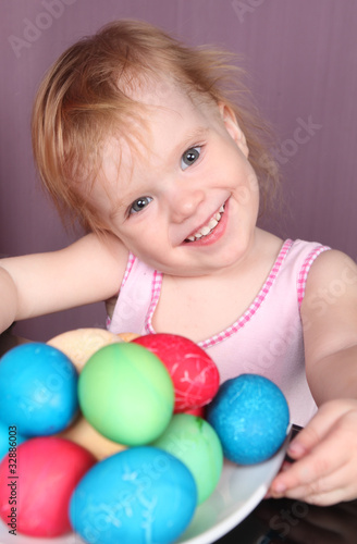 The joyful girl and easter eggs
