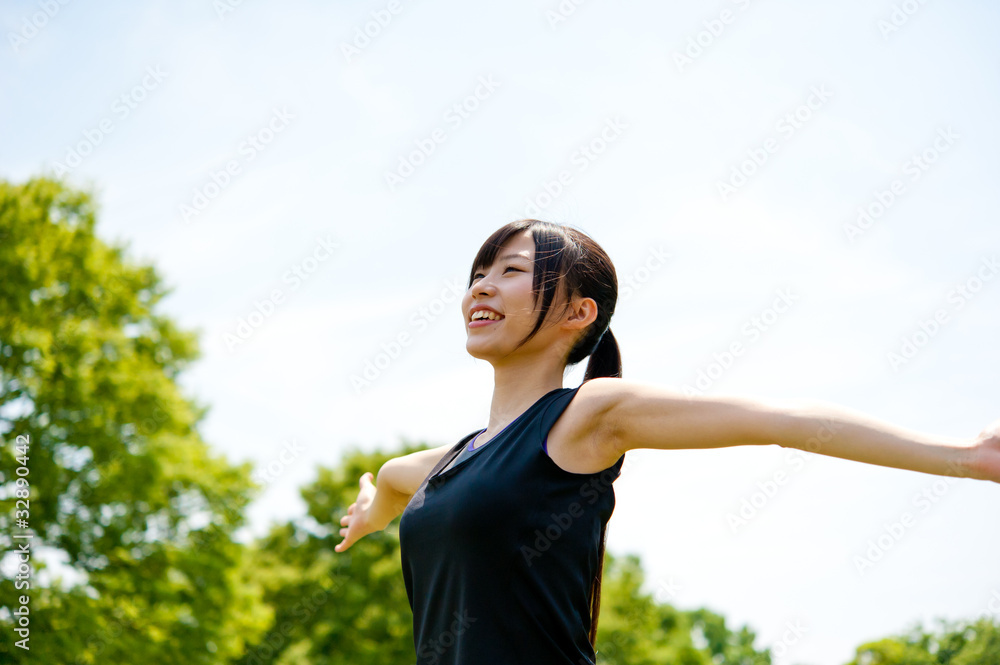beautiful asian woman relaxing in the park beautiful asian woman relaxing in the park
