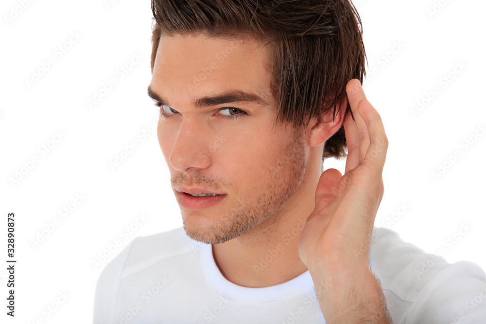 Fototapeta premium Junger Mann versteht etwas schlecht