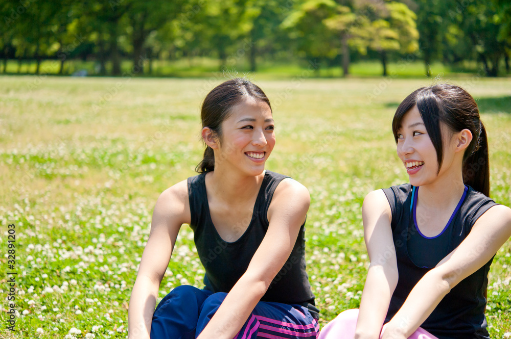 beautiful asian women relaxing in the park beautiful asian women relaxing in the park