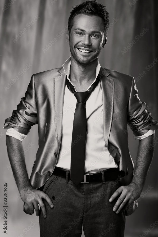 Fashion latin man looking at camera with confidence Fashion latin man looking at camera with confidence