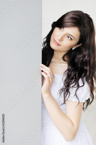 Portrait of beautiful young woman looking at copy space